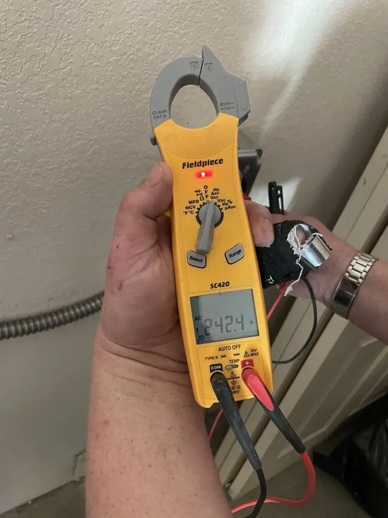 Voltage testing with clamp meter during Electrical Installation Services in Upland